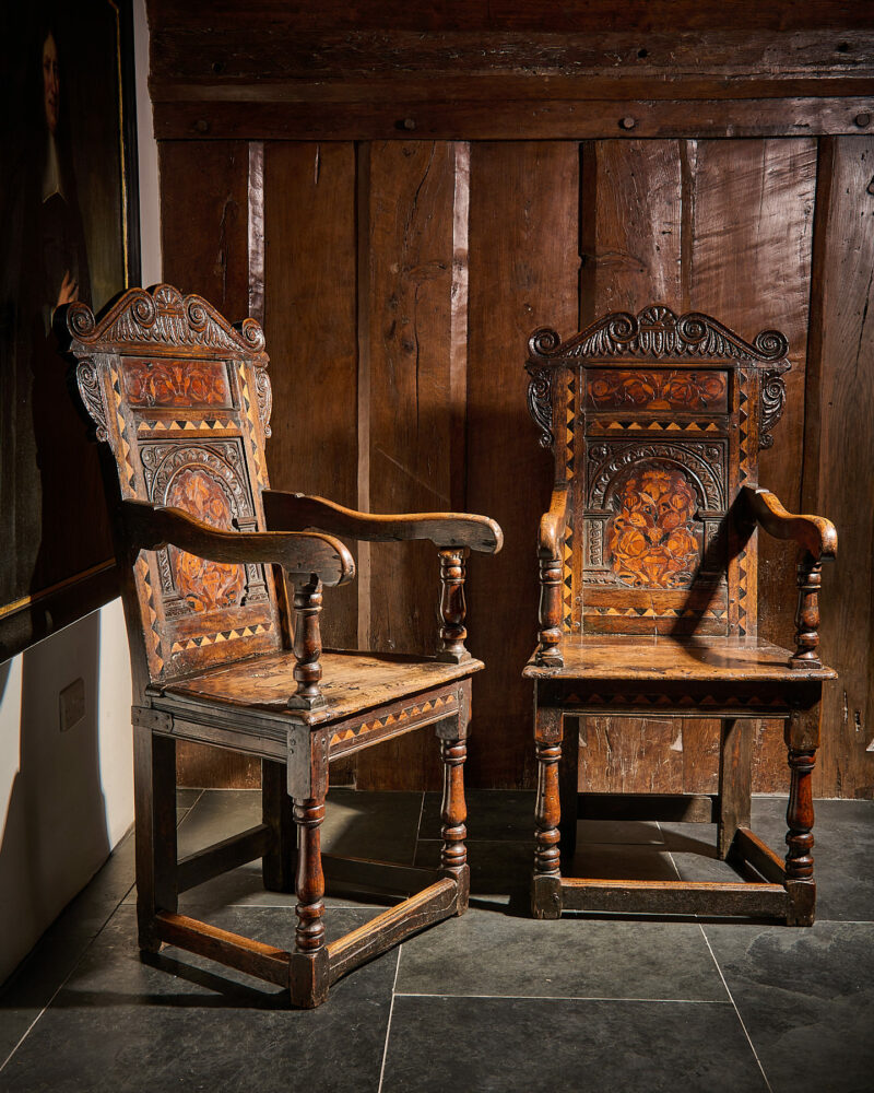 Pair of 17th century inlaid and carved armchairs