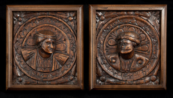 Pair of Henry VIII oak carved panels