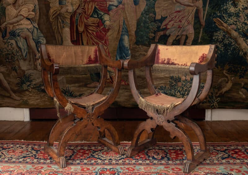 Pair of 16th century walnut Savonarola armchairs