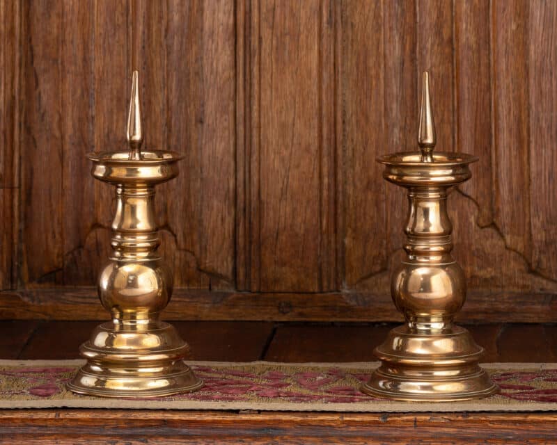 Pair of renaissance brass candlesticks