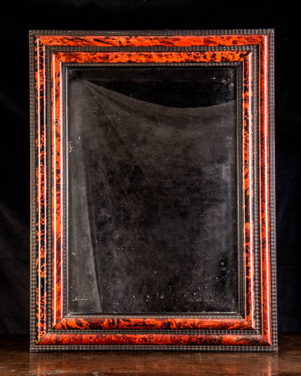Ebonised turtle shell mirror