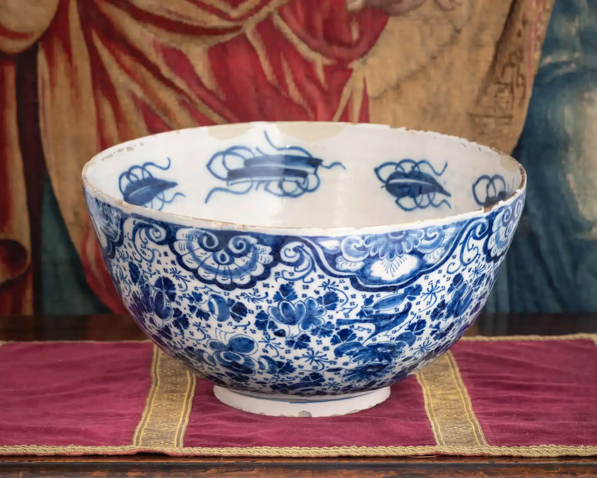 Large Delftware punch bowl with “insect” border