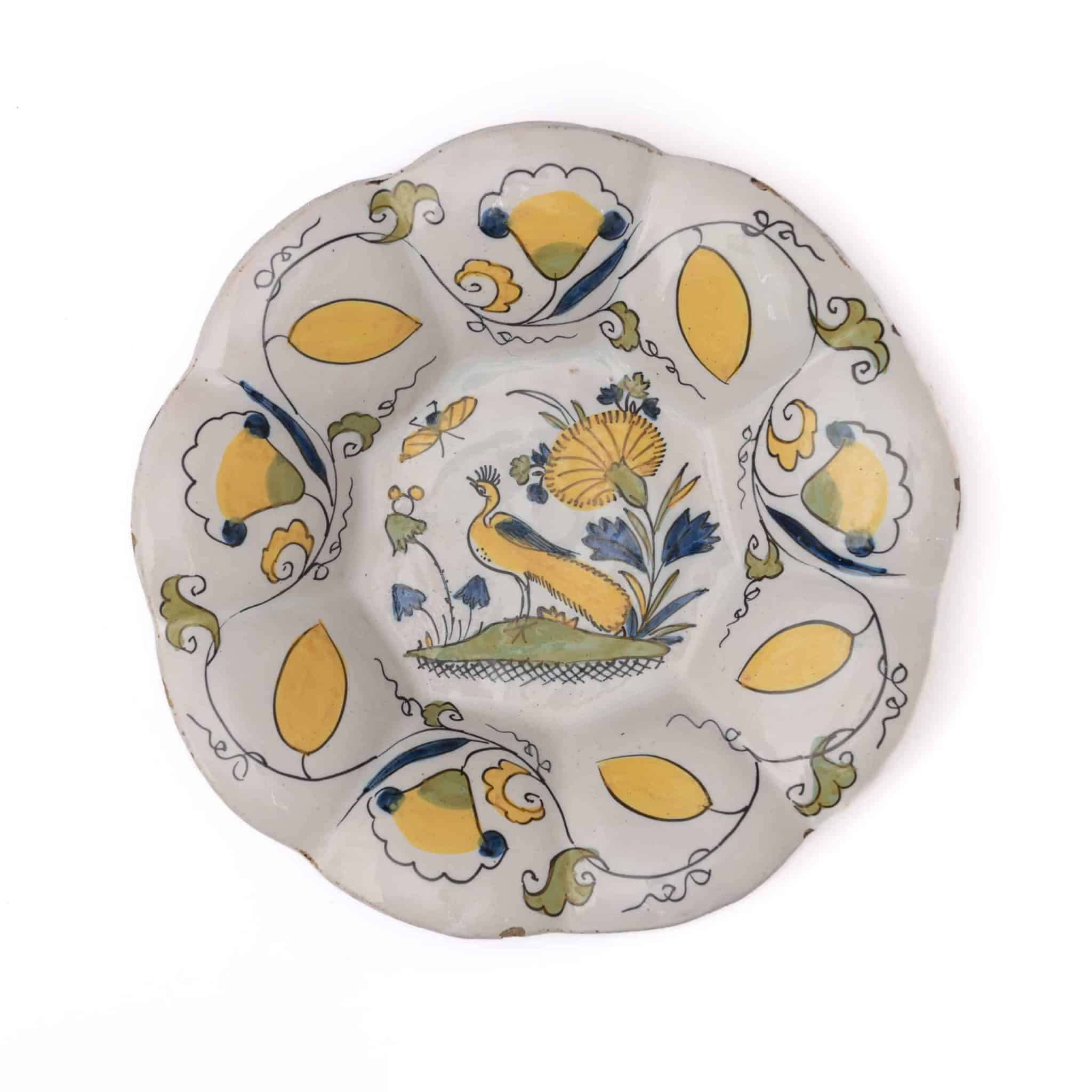 Dutch Delftware Polychrome Lobed Plate with a Peacock Decoration