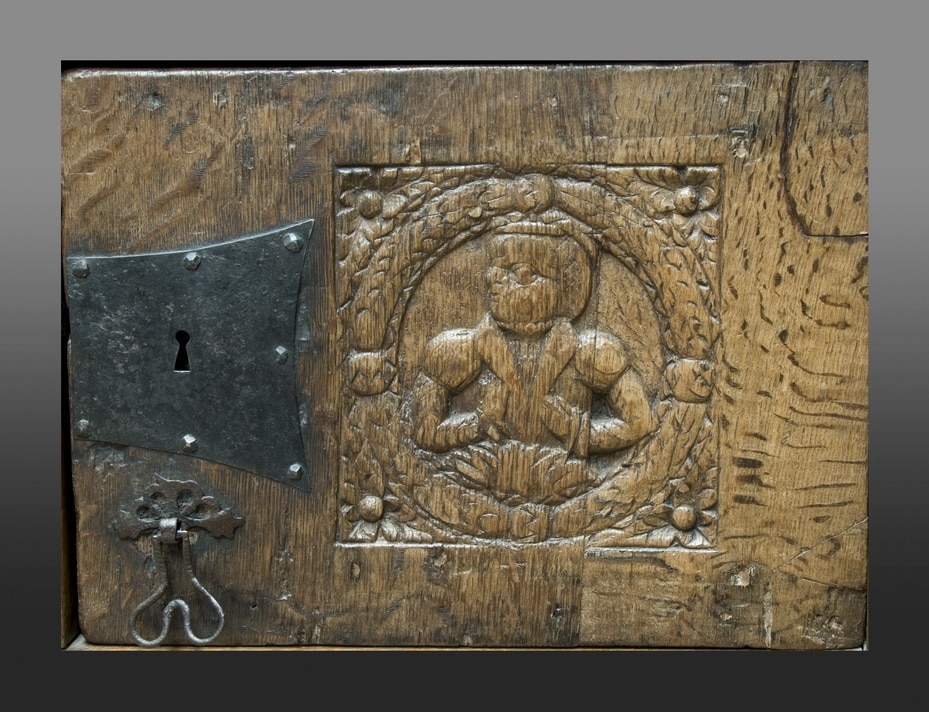 Pair of carved oak doors form a late medieval English standing cupboard