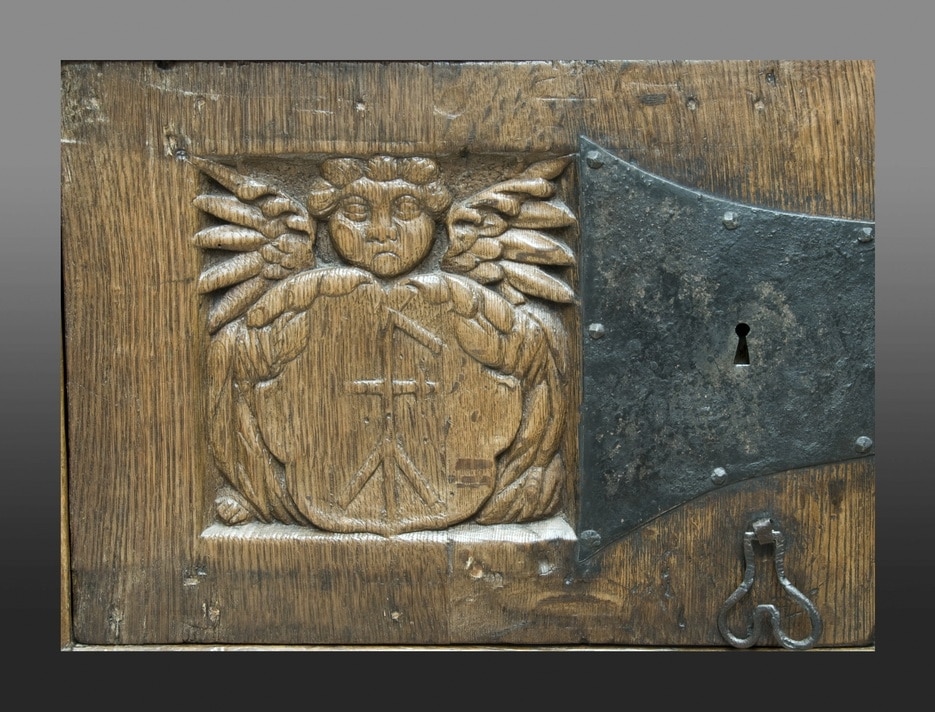Pair of carved oak doors form a late medieval English standing cupboard