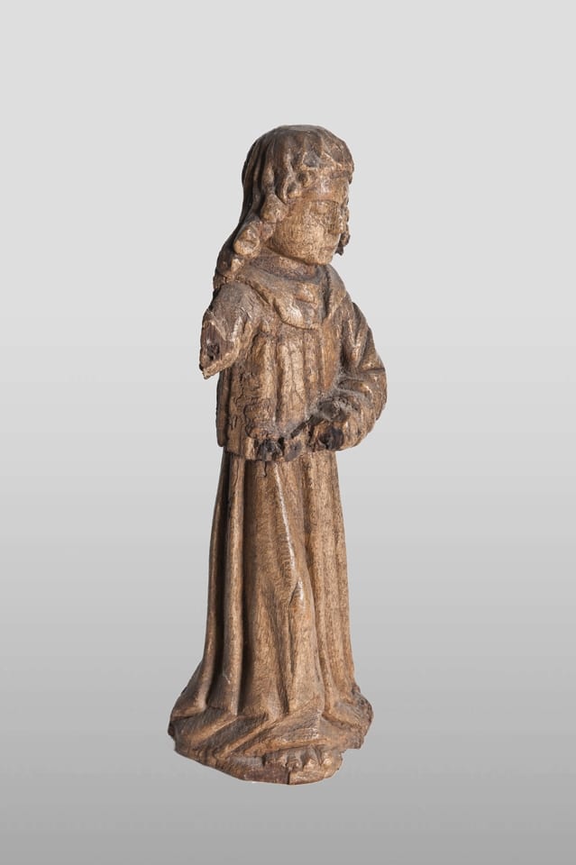 15th century oak sculpture of an angel candle bearer