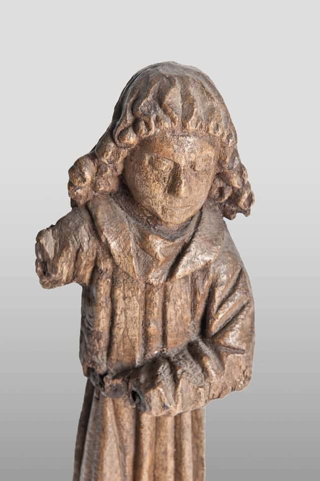 15th century oak sculpture of an angel candle bearer
