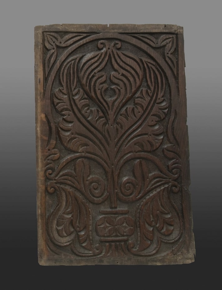 Panels carved with Dennis-like botanical motifs