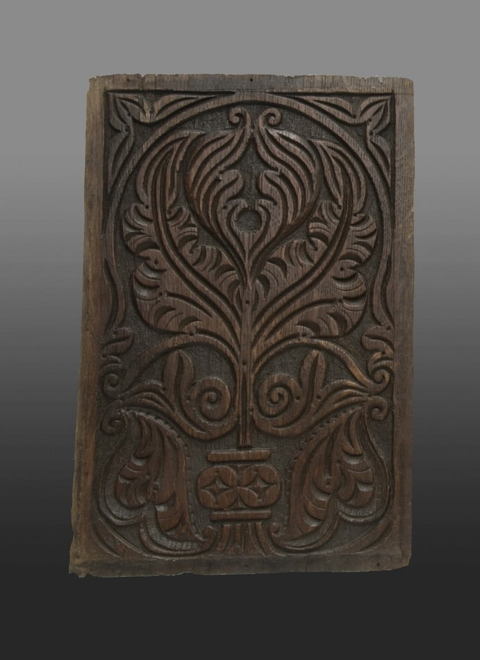 Panels carved with Dennis-like botanical motifs