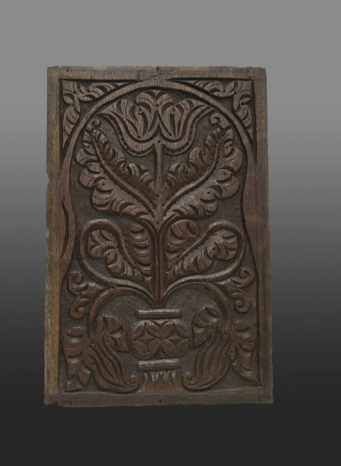 Panels carved with Dennis-like botanical motifs