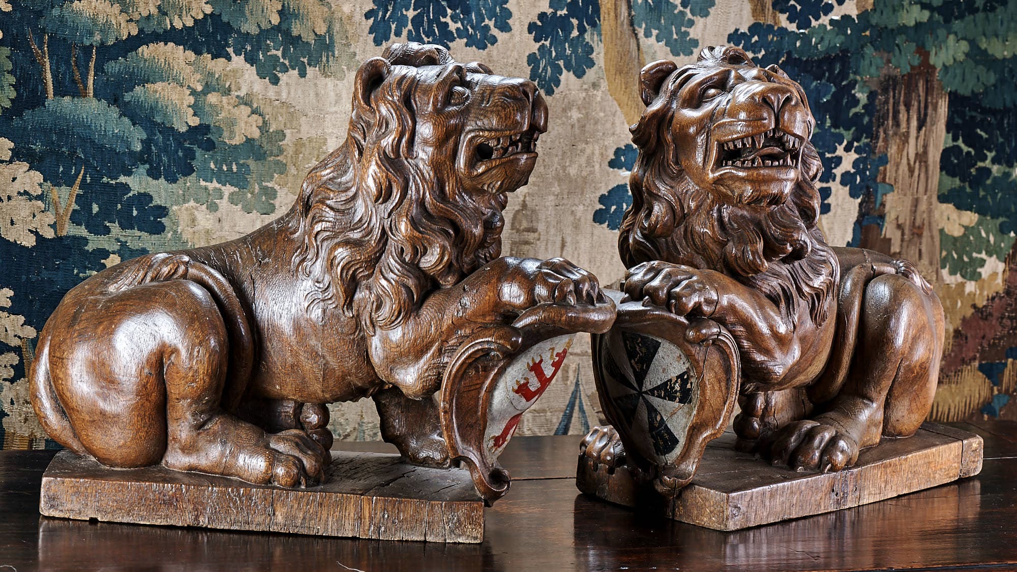 Pair of 17th century heraldic lions