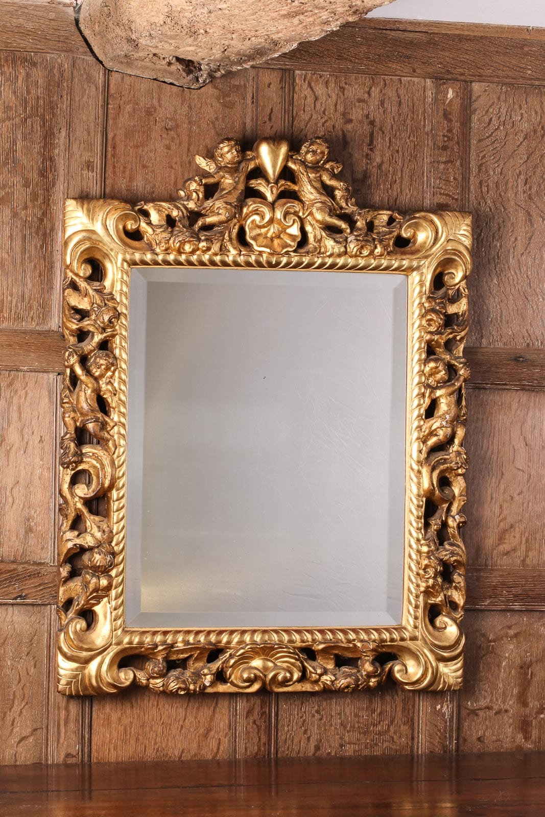 Charles II carved gilt wood mirror