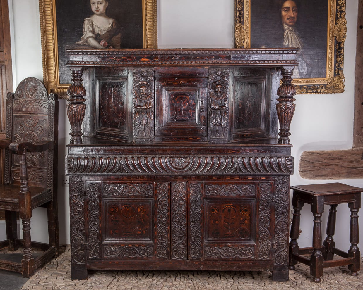 James I oak carved and inlaid press cupboard