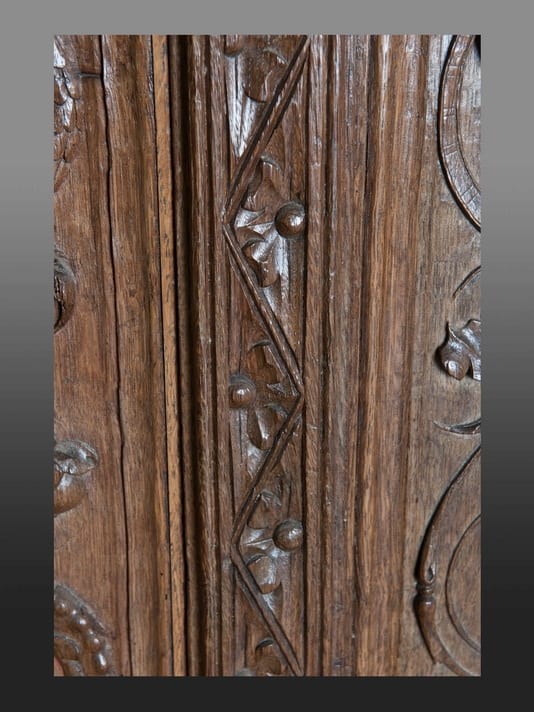 Henry VIII carved oak headboard