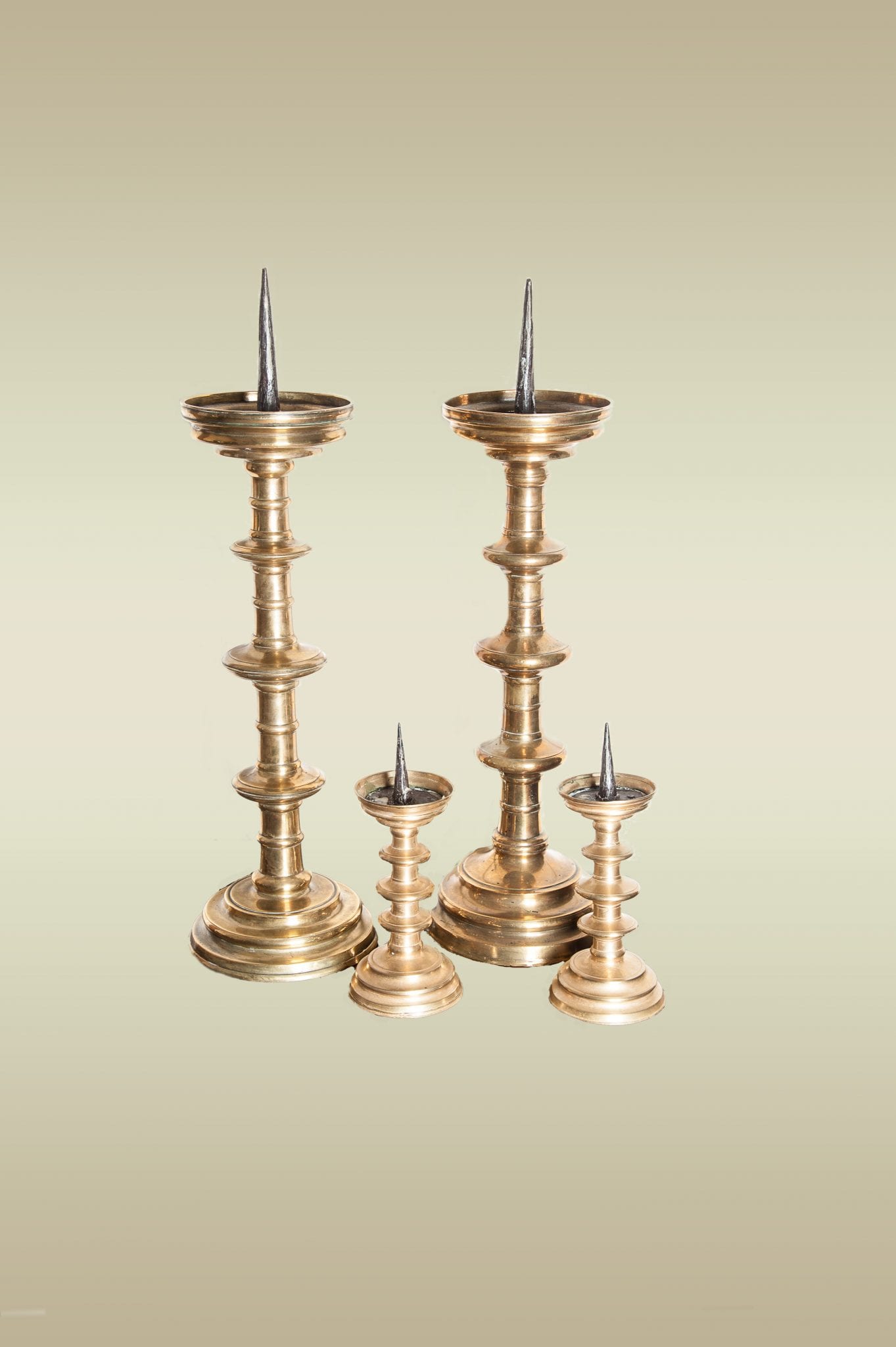 Massive pair of Gothic brass pricket sticks