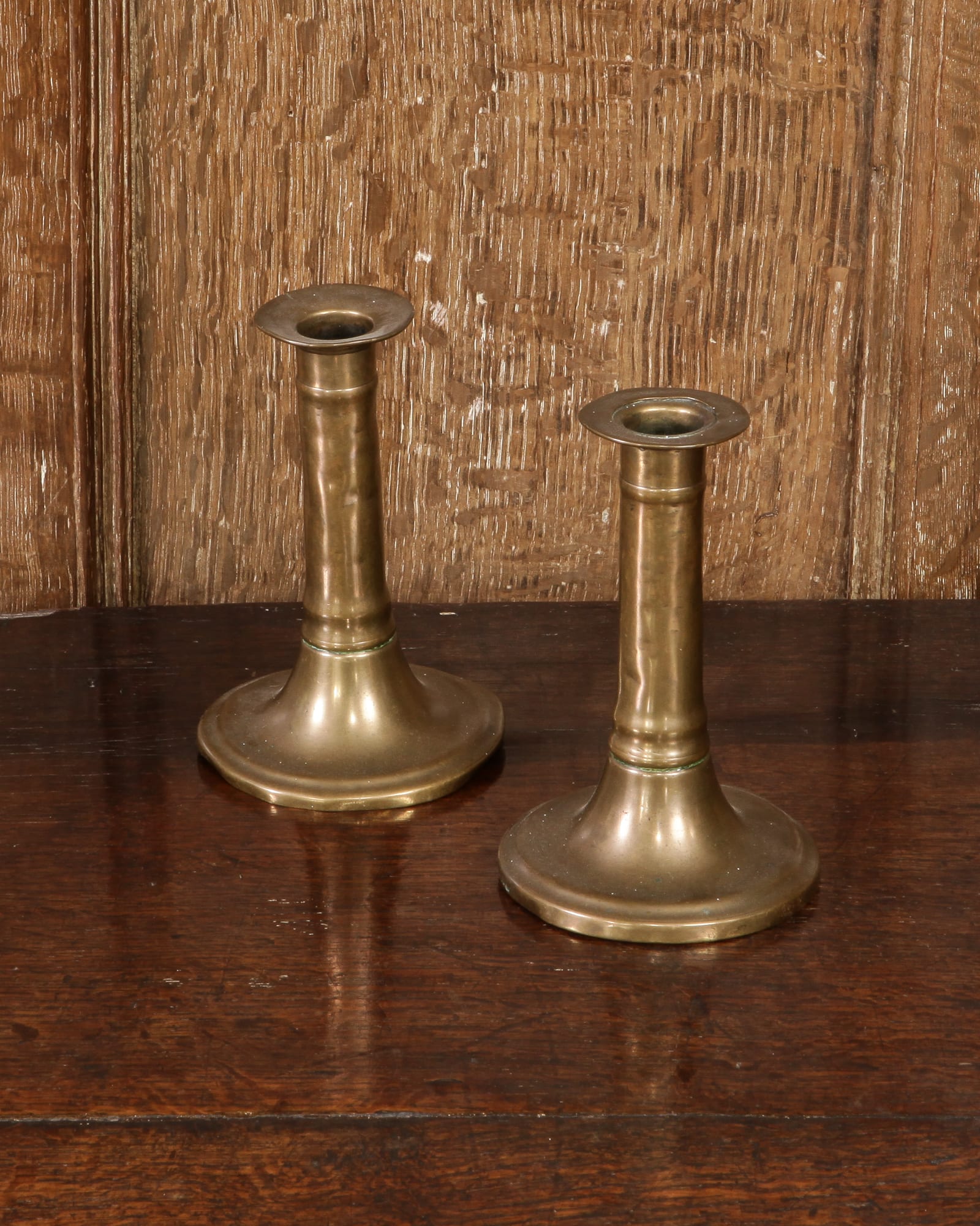 17th century pair of brass candlesticks