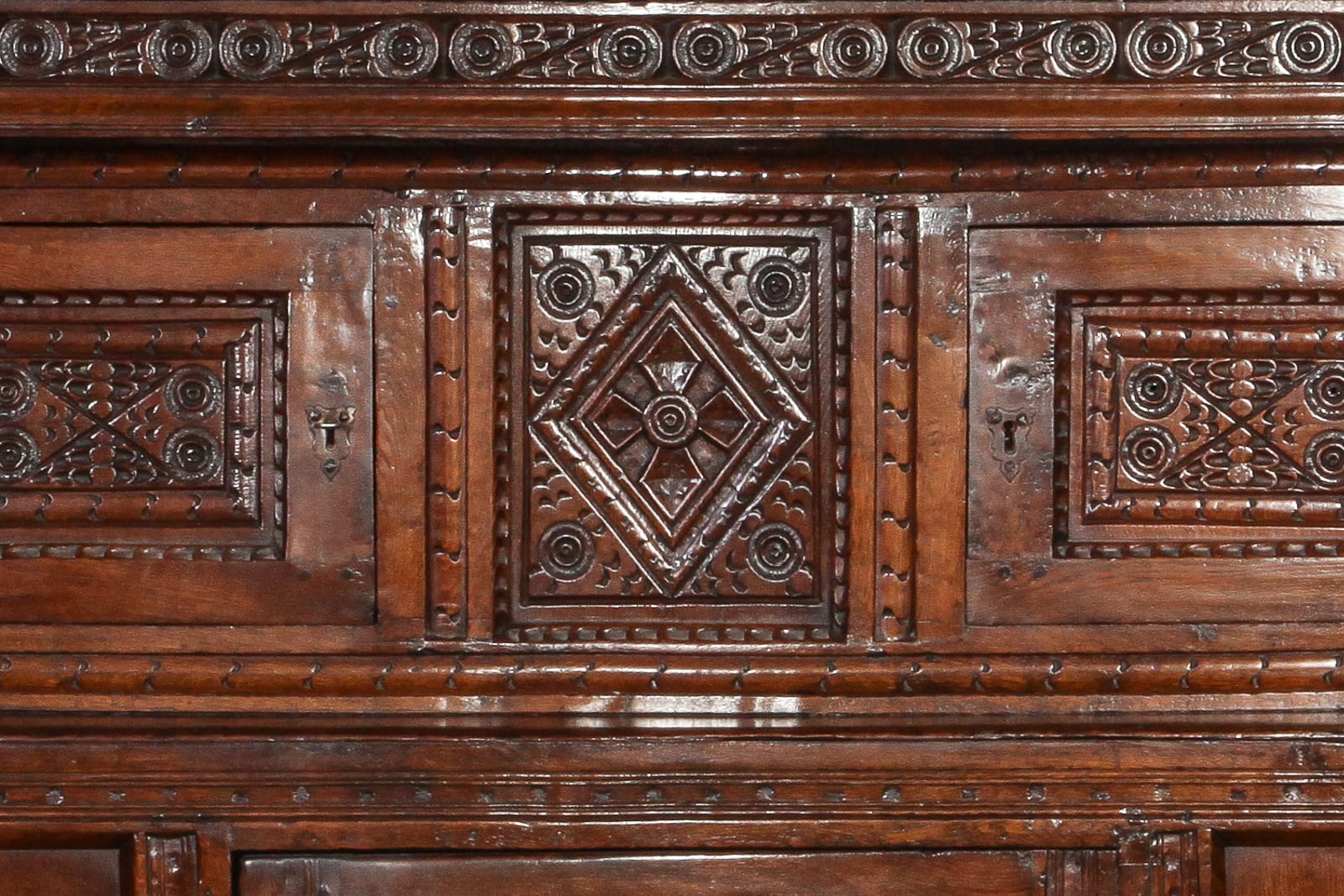 Charles II carved press cupboard
