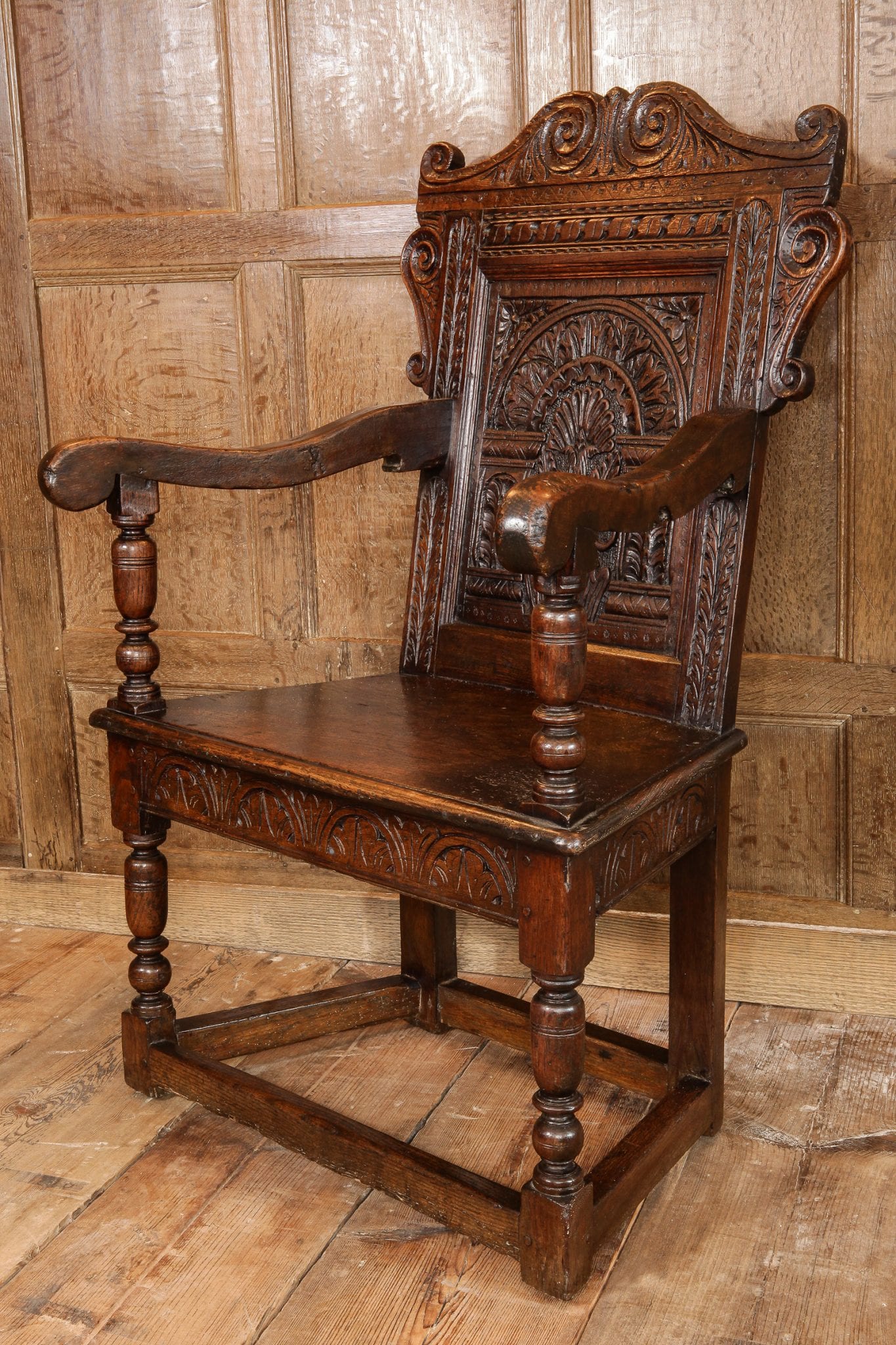 Pair of James I oak carved armchairs