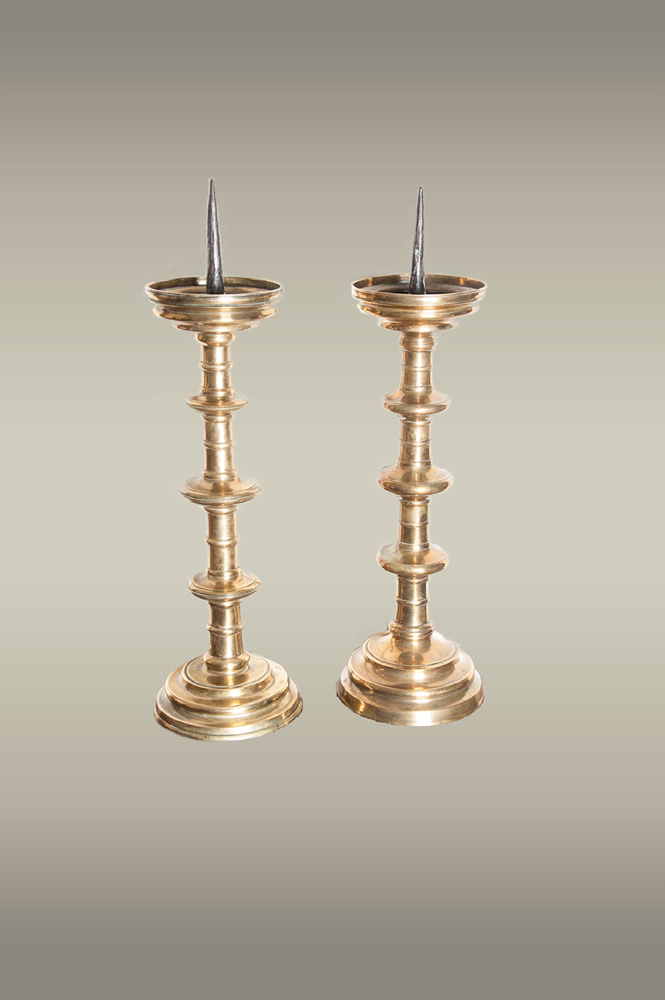 Massive pair of Gothic brass pricket sticks