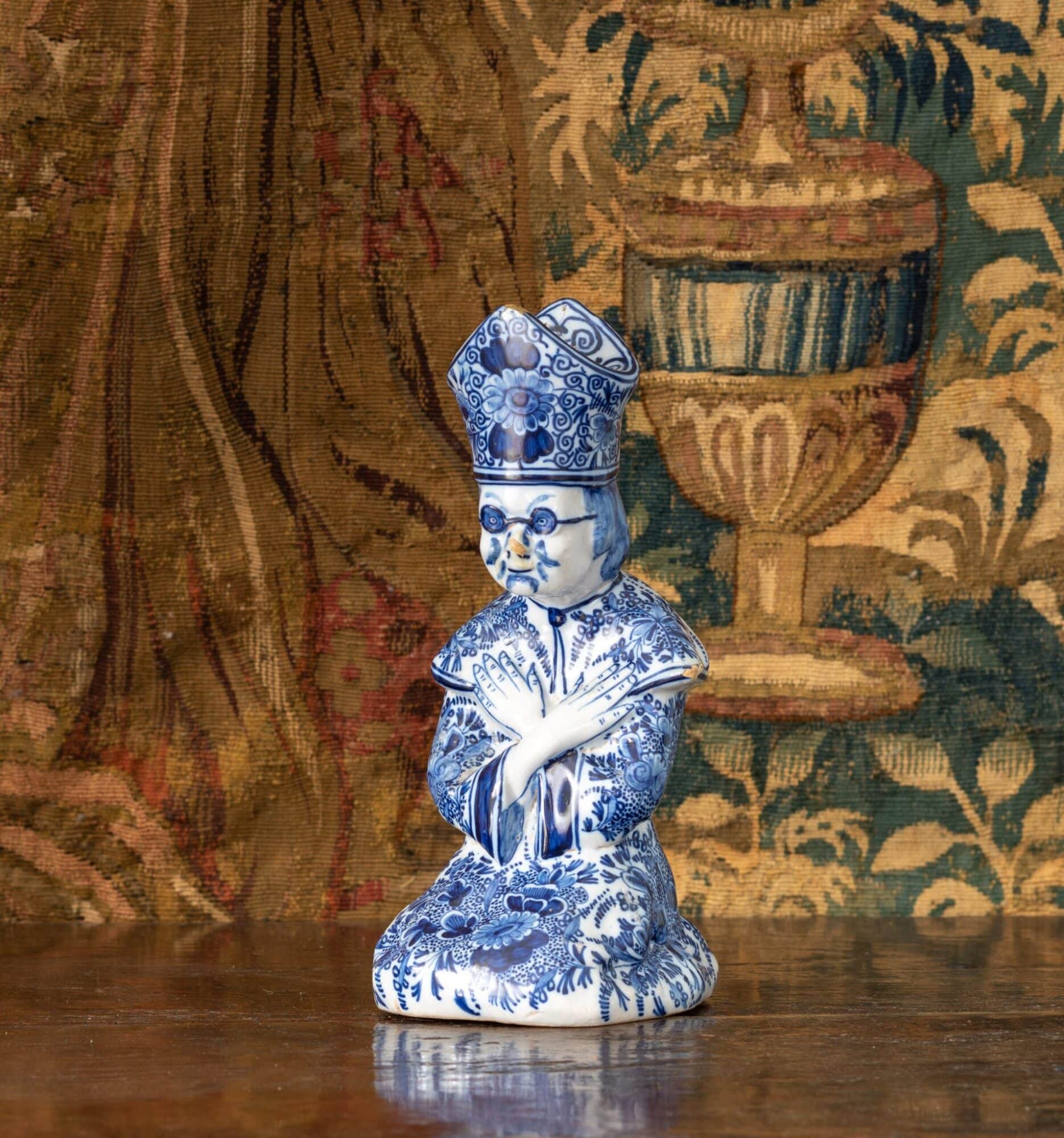 Dutch Delftware figural candlestick in the form of a Bishop
