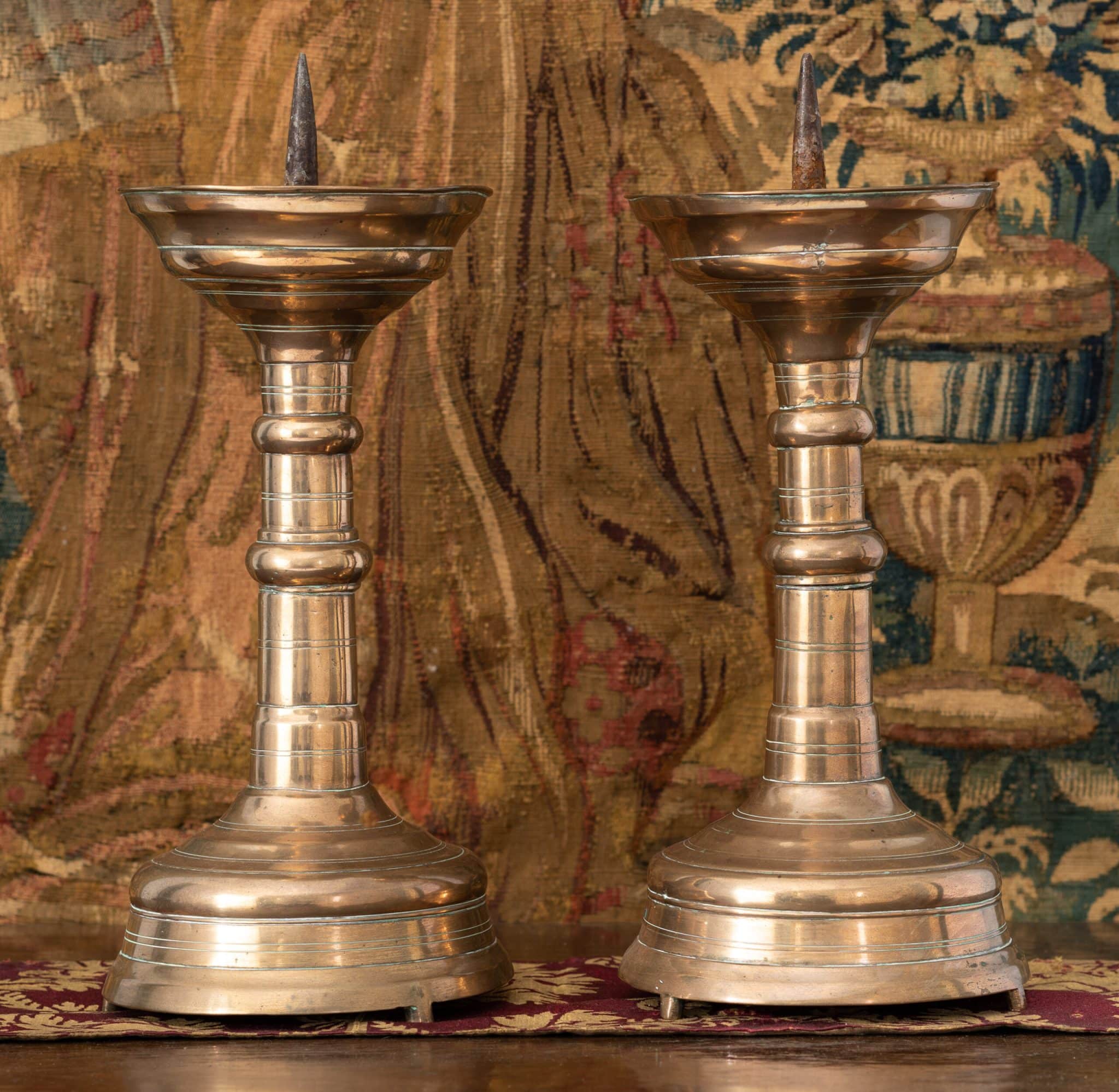 Pair of Gothic bronze candlesticks