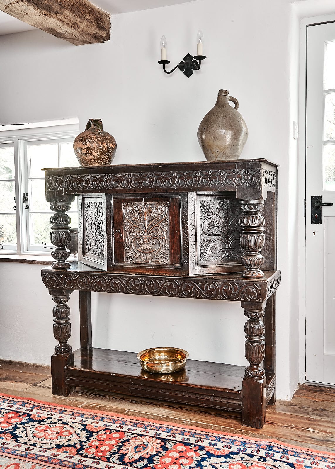 James I oak carved livery cupboard