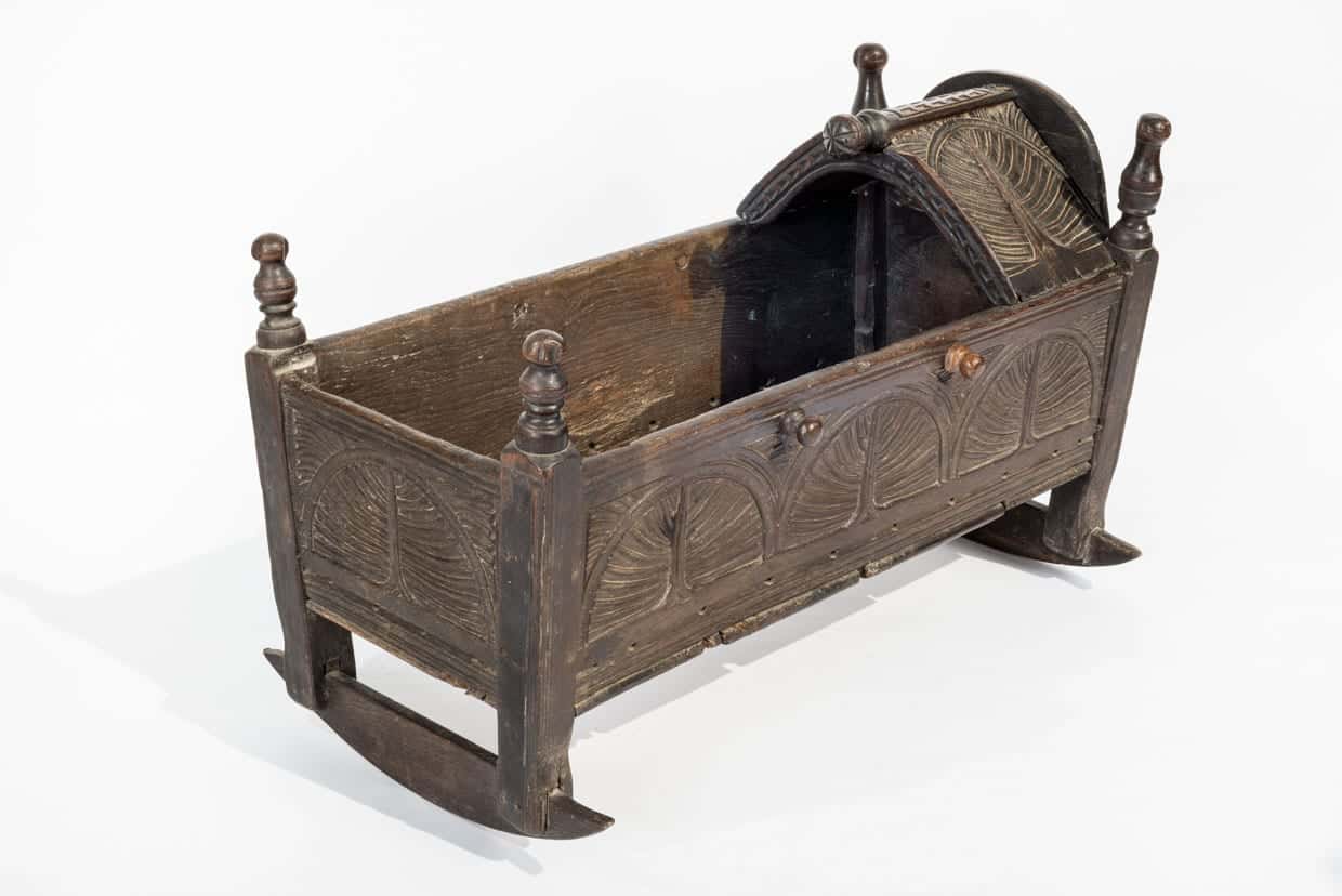 17th century carved oak cradle