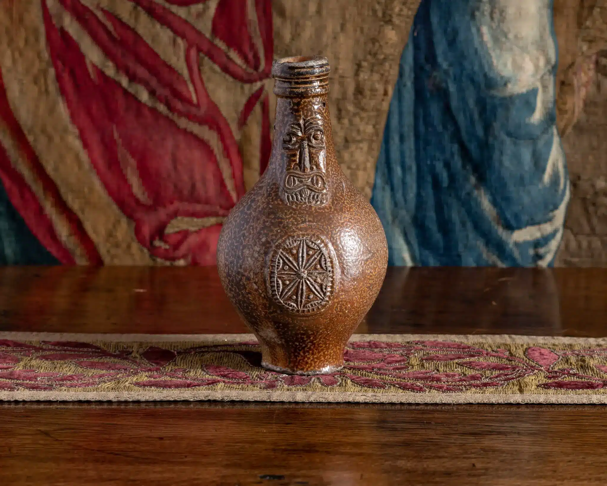 Salt glazed stoneware Bellarmine jug