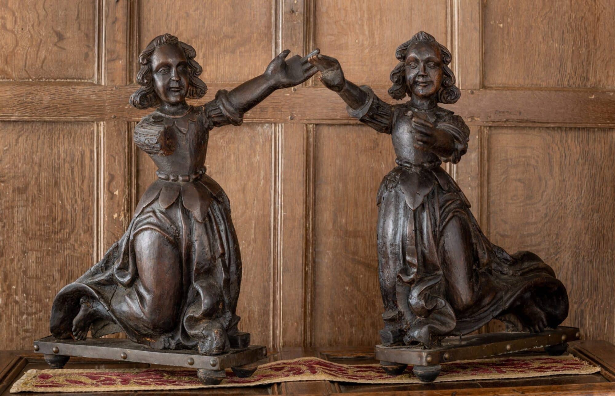 A Pair of English Oak Carved Figures