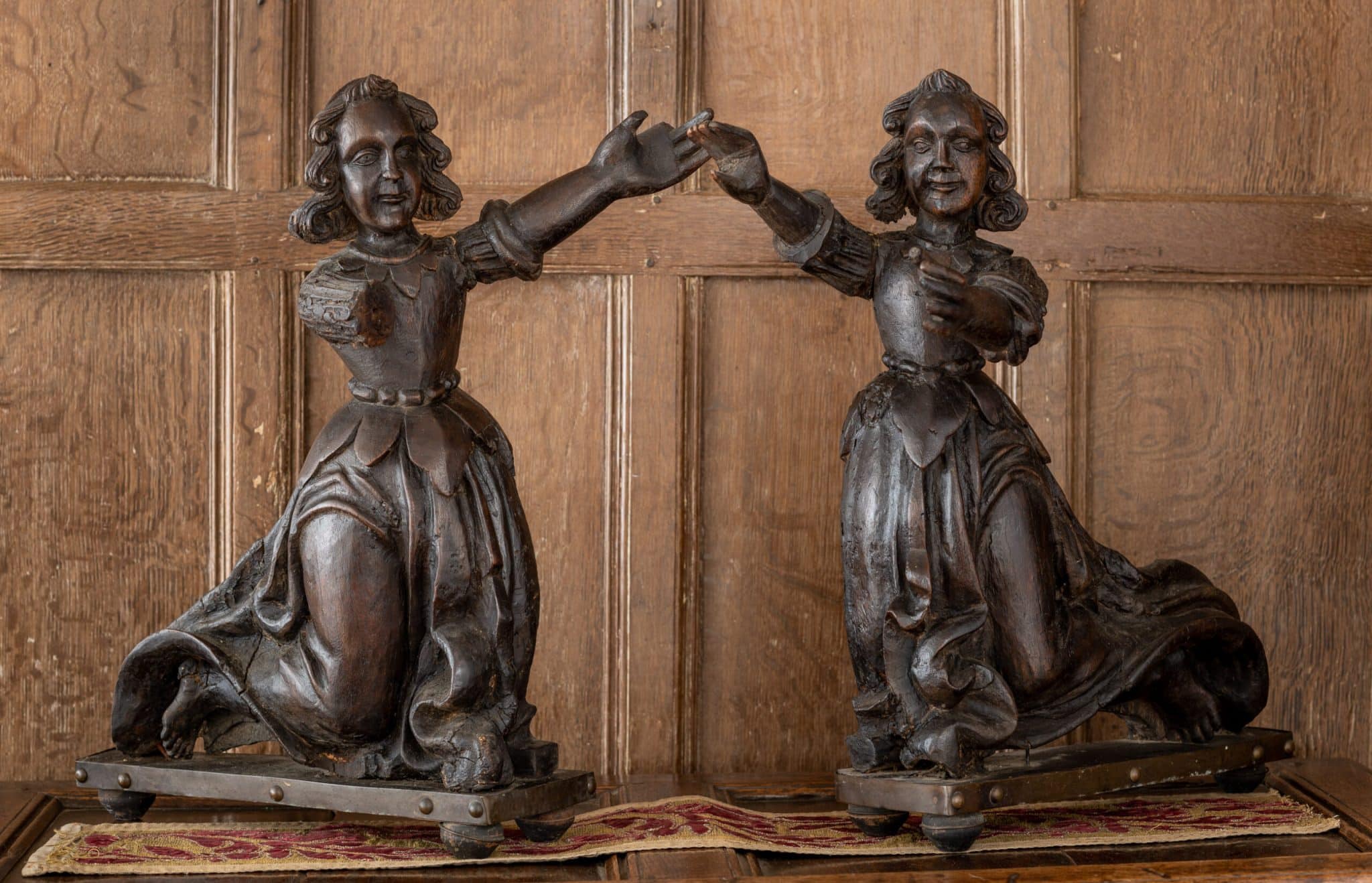 A Pair of English Oak Carved Figures