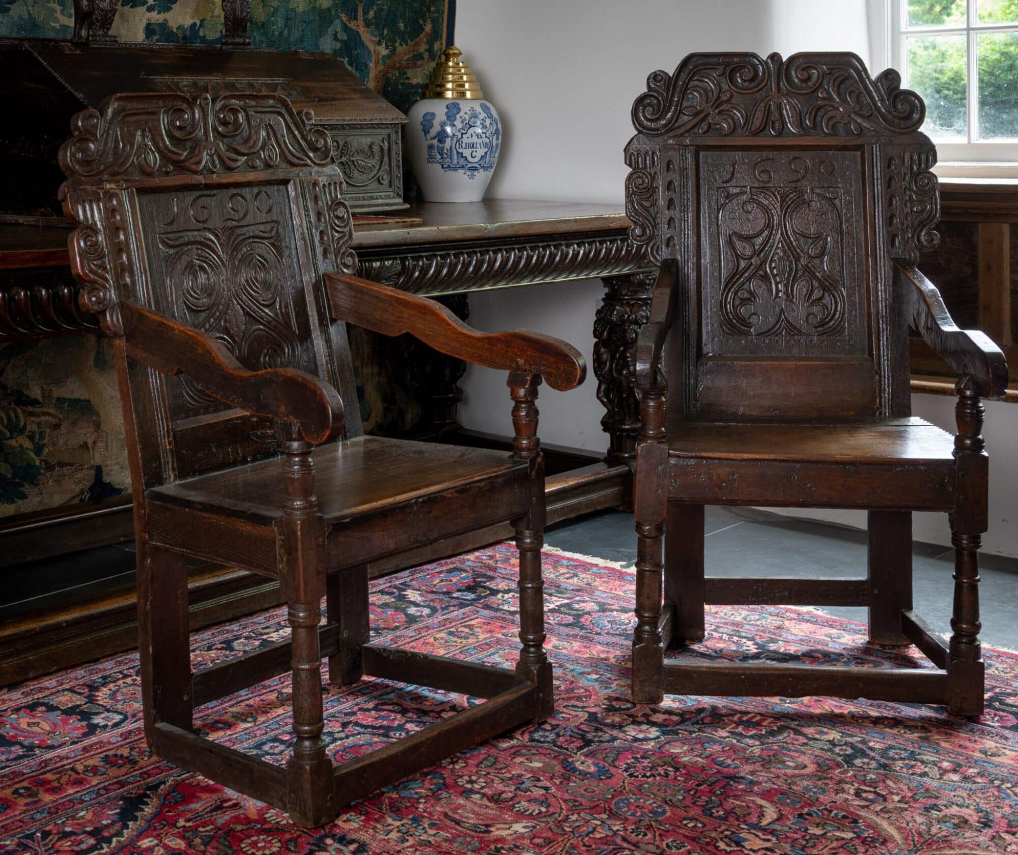 James II pair of joined oak armchairs