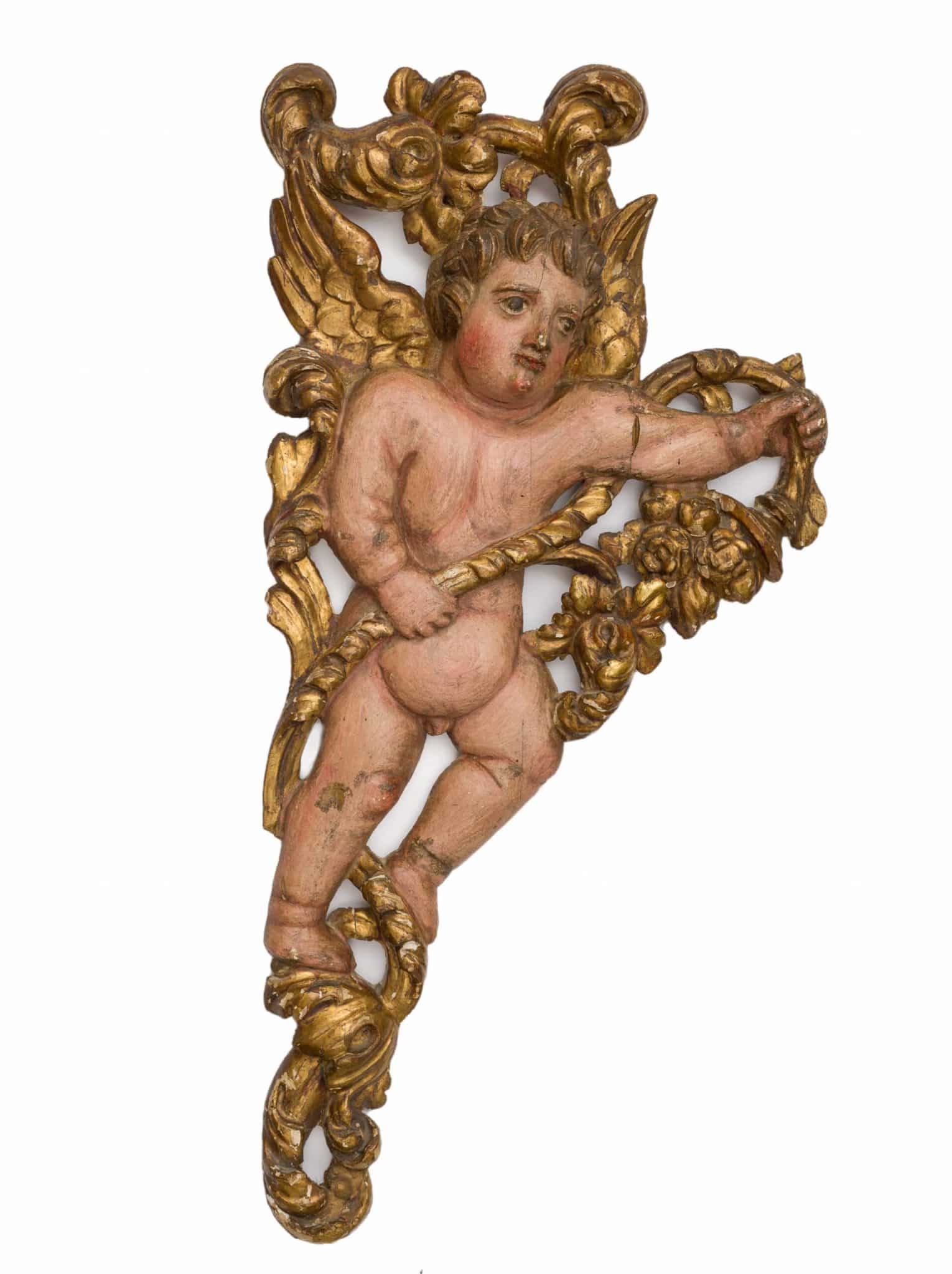 Pair of Baroque winged putti from a retablo