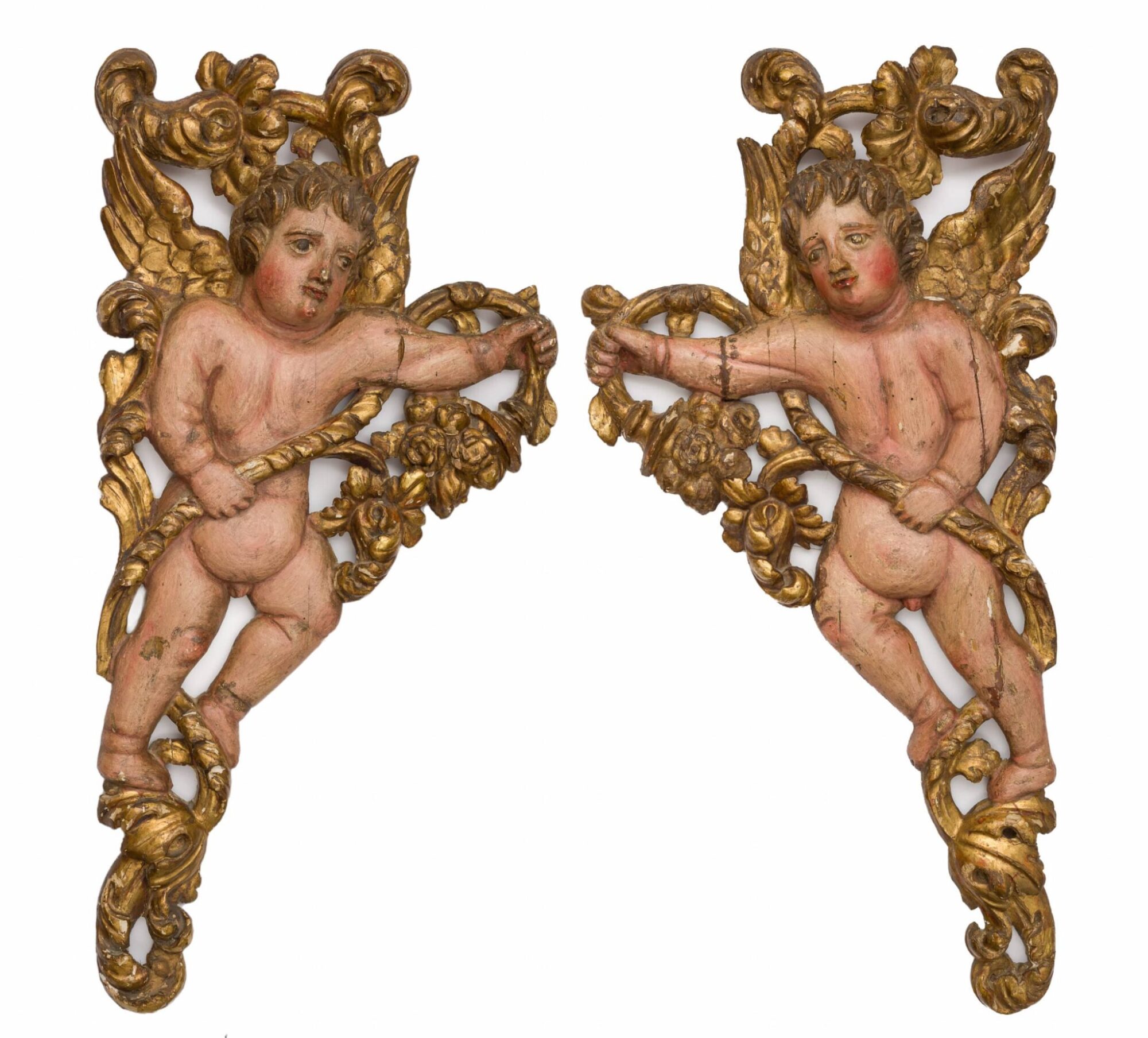 Pair of Baroque winged putti from a retablo