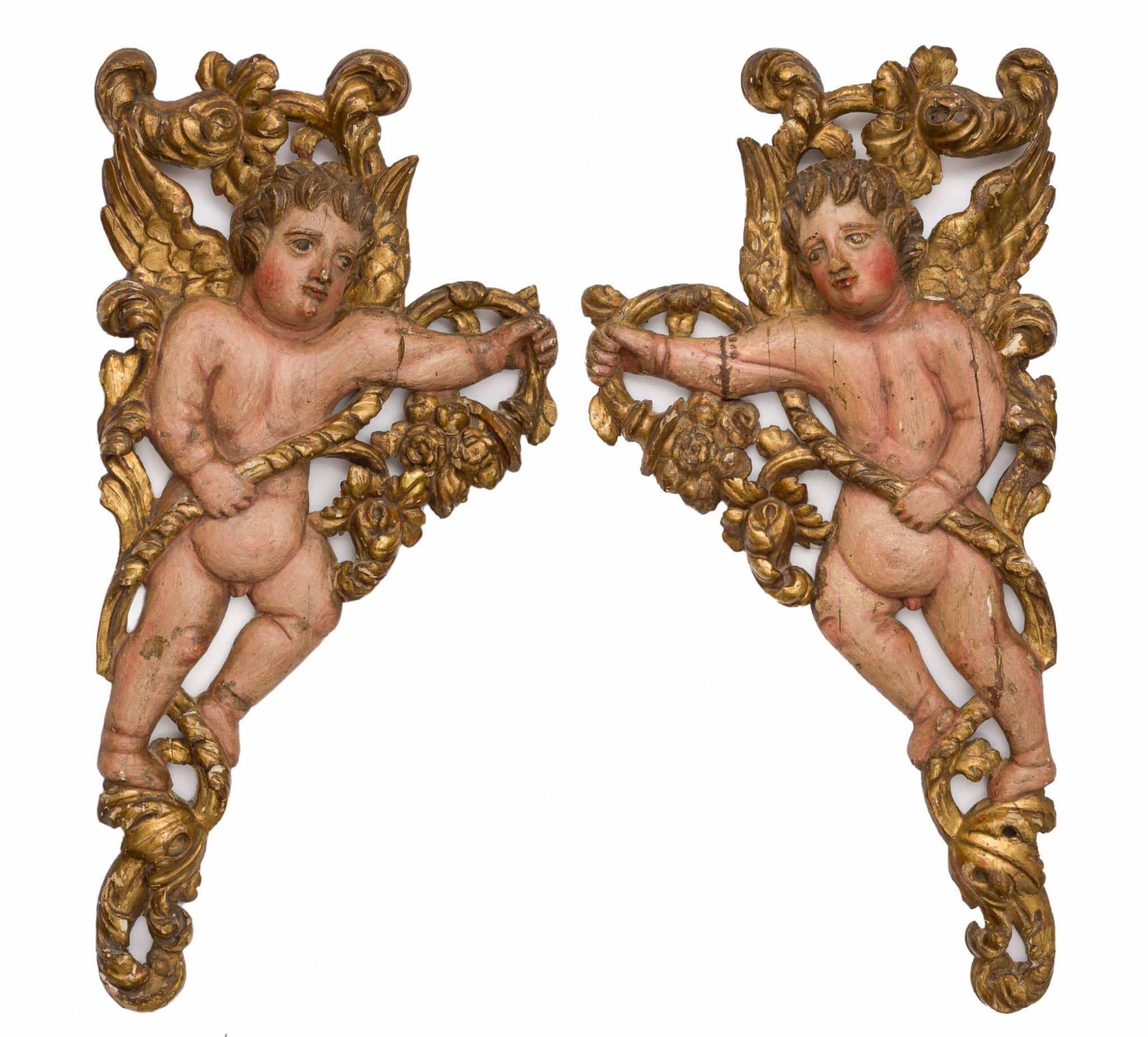 Pair of Baroque winged putti from a retablo