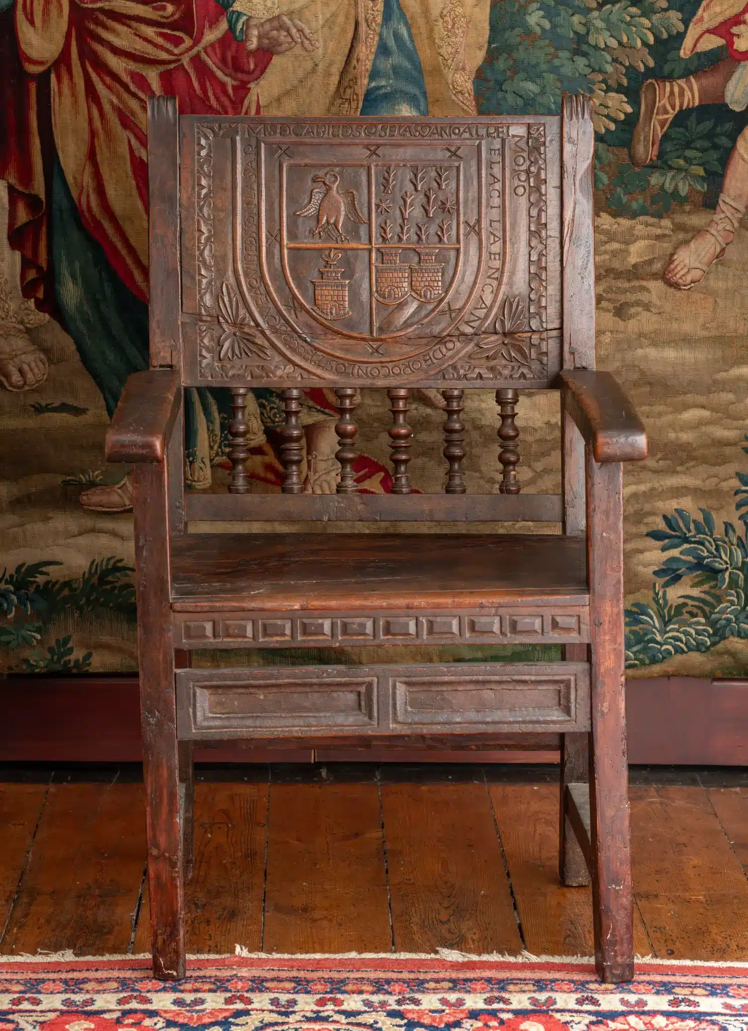 16th century Spanish walnut armorial armchair