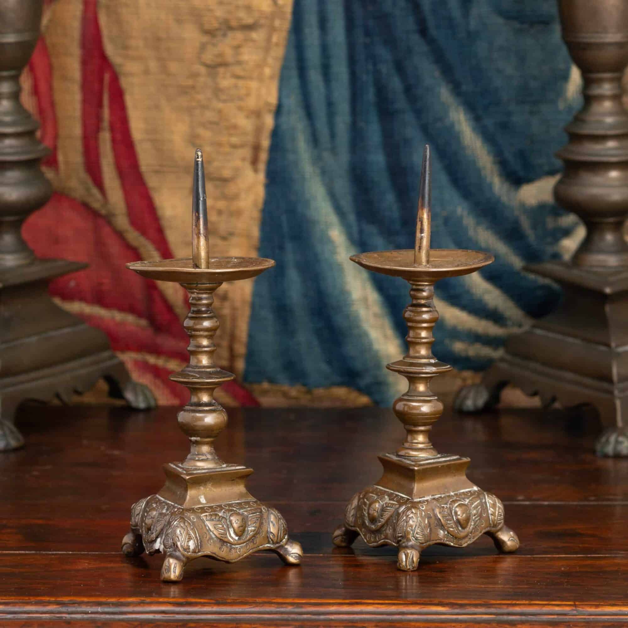 Tiny pair of brass pricket candlesticks