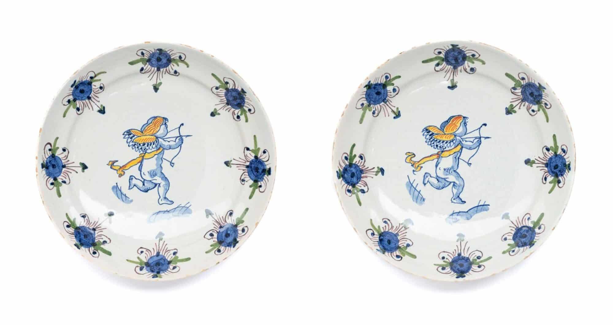 A Pair of Delftware Polychrome Plates