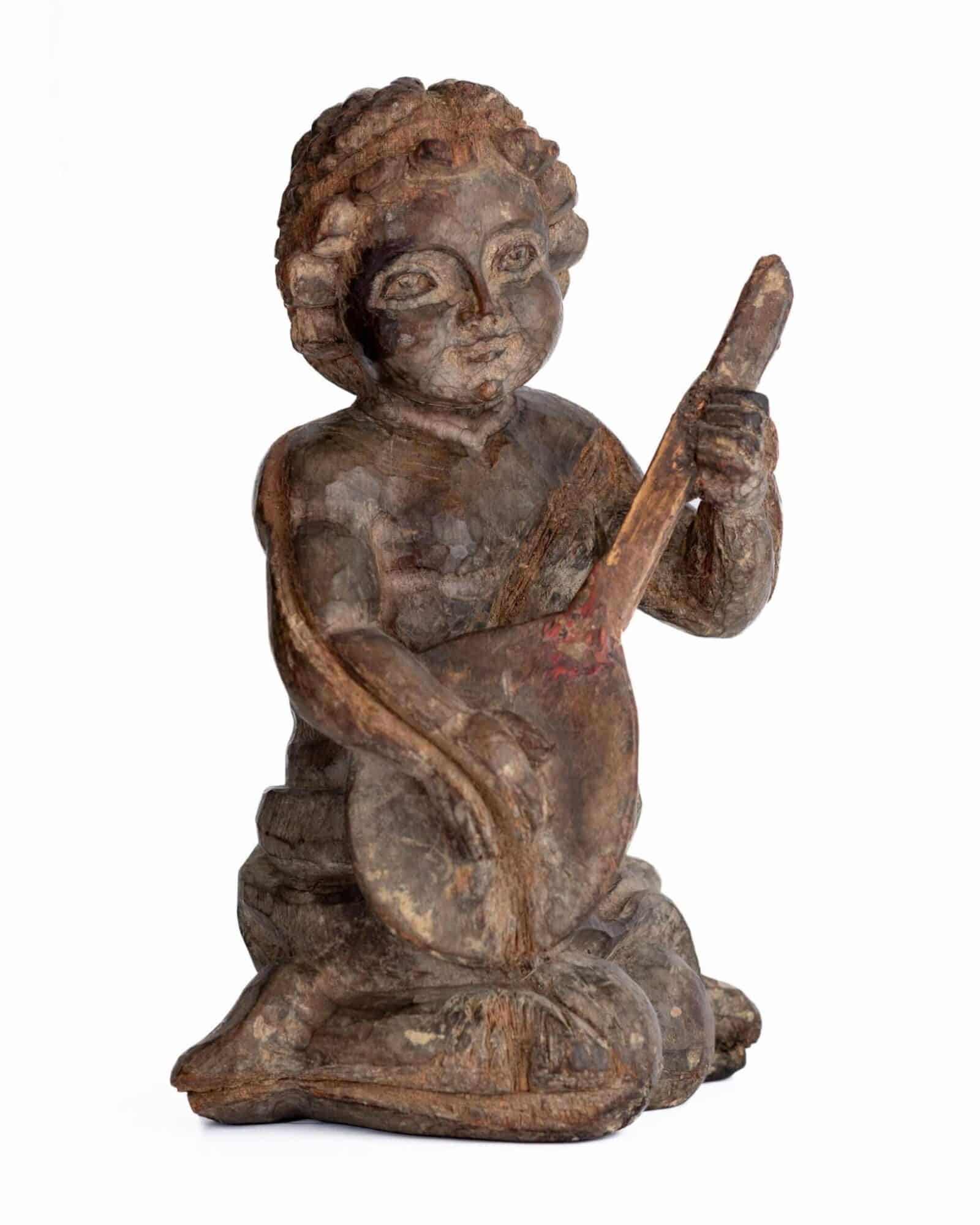 Late 16th century walnut lute player