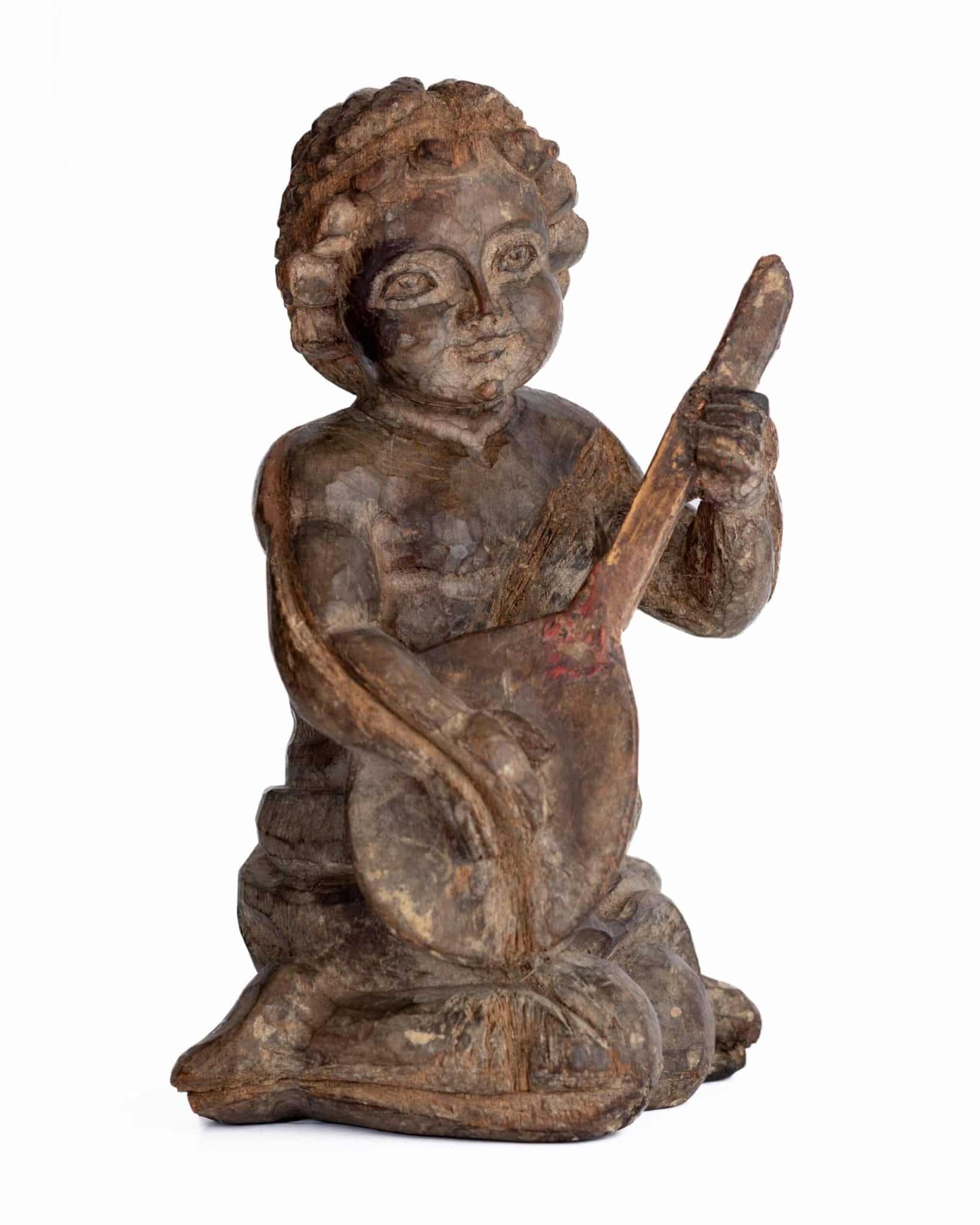 Late 16th century walnut lute player