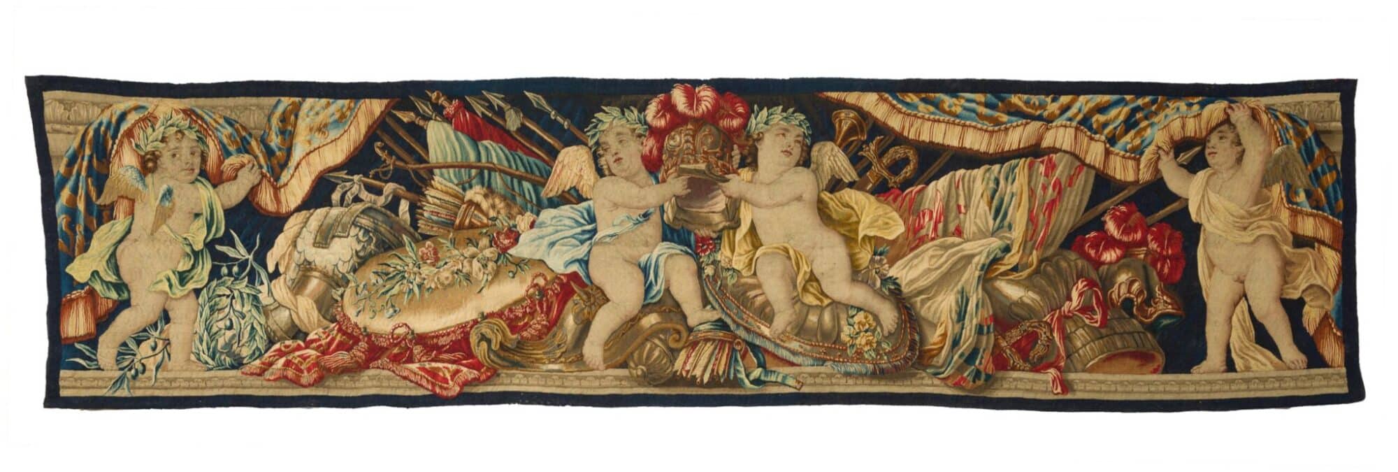 A Pair of Flemish Tapestry Borders Depicting Putti with Martial Trophies