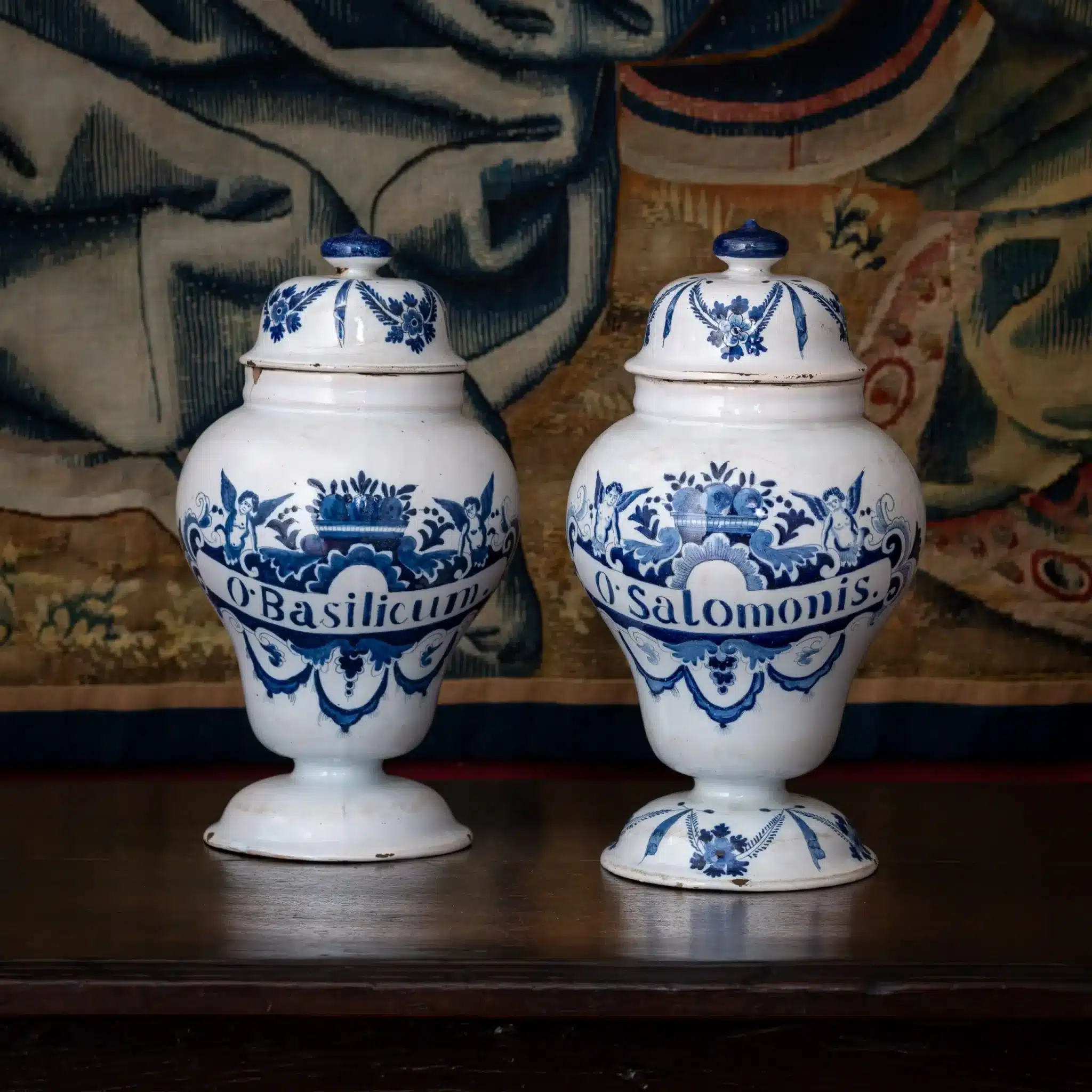 A Matched Pair of Delftware Apothecary Jars with Lids