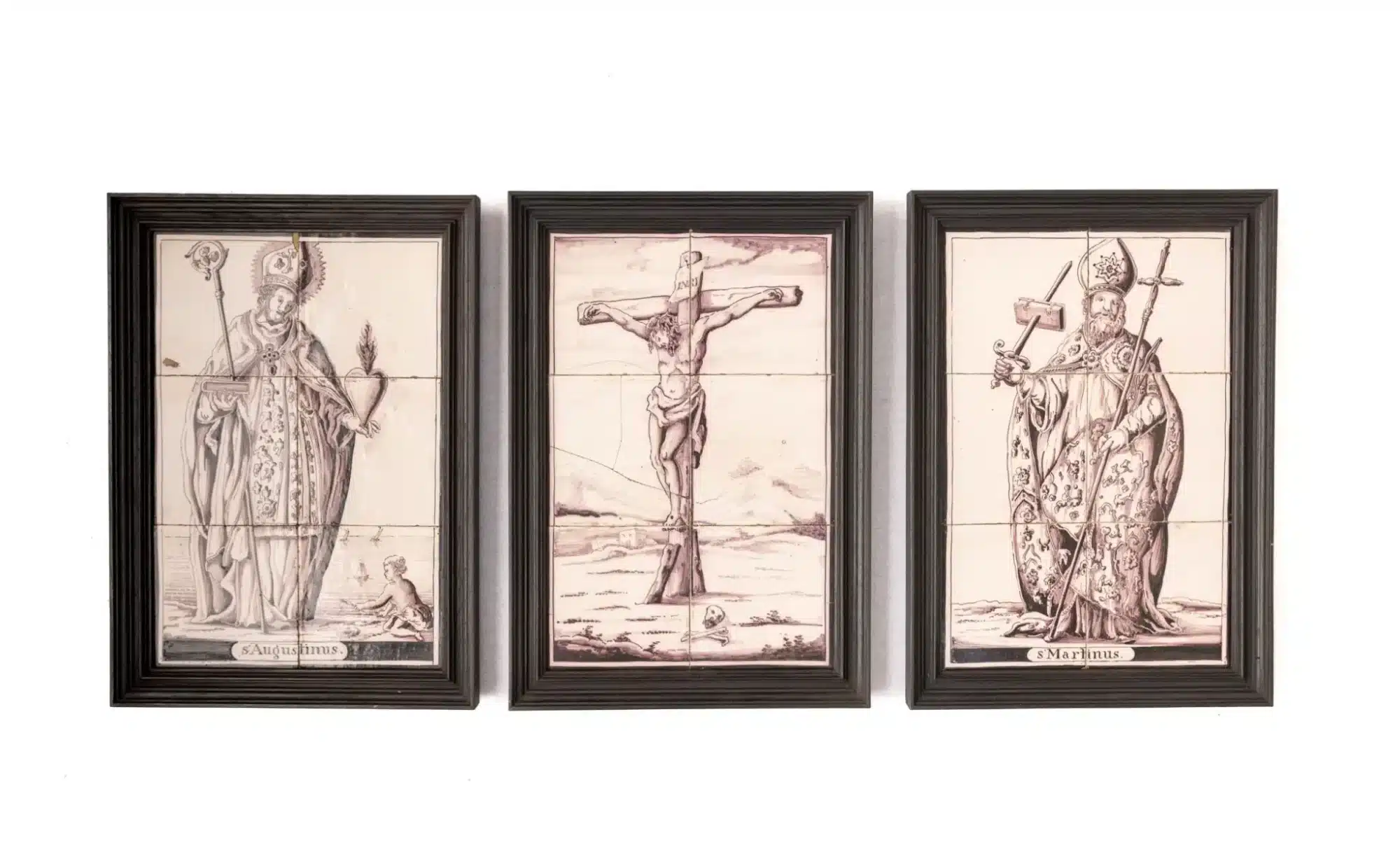 A Set of Three Dutch Delft Tile Panels Depicting St Augustine, the Crucifixion, and St Martin