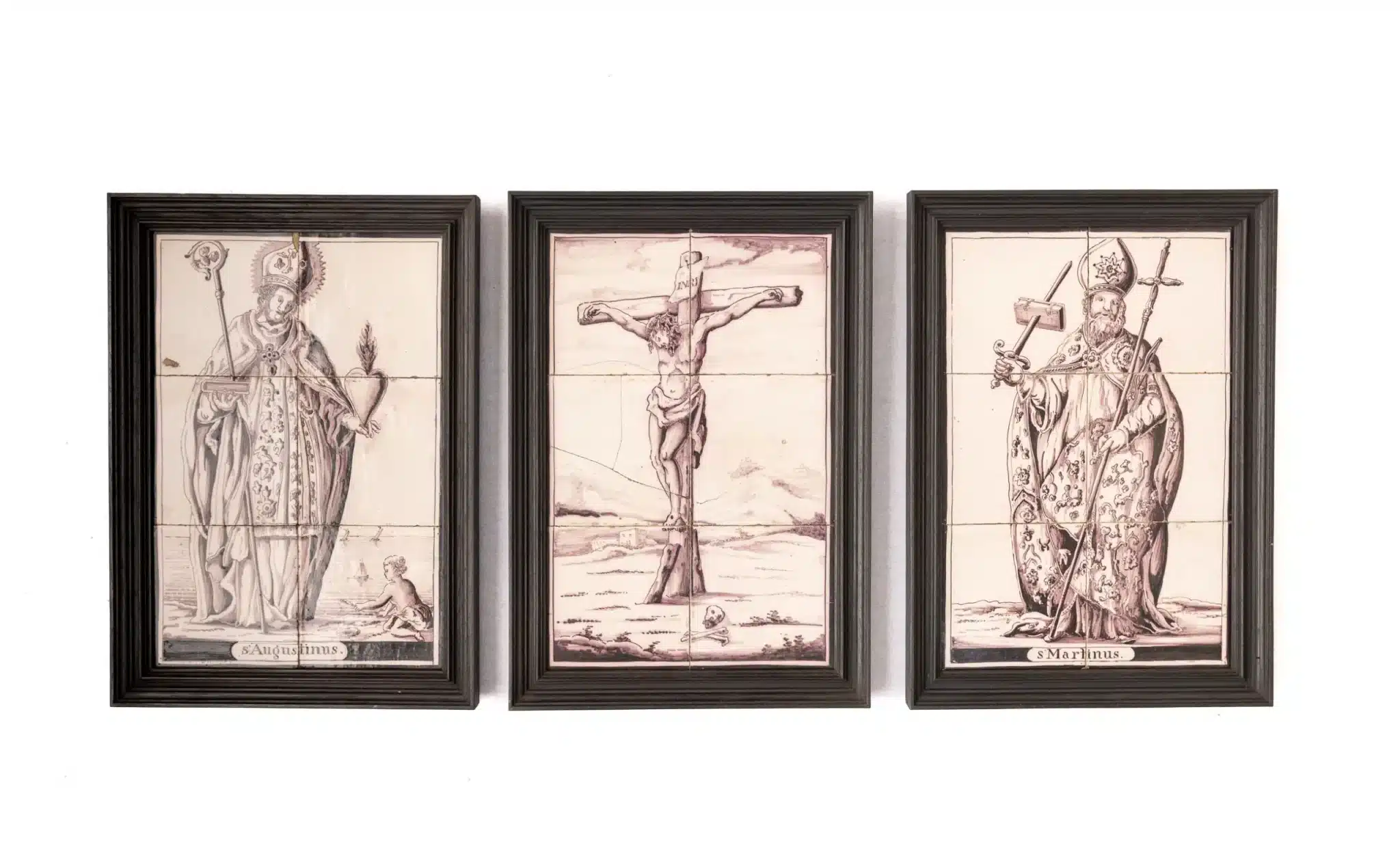 A Set of Three Dutch Delft Tile Panels Depicting St Augustine, the Crucifixion, and St Martin