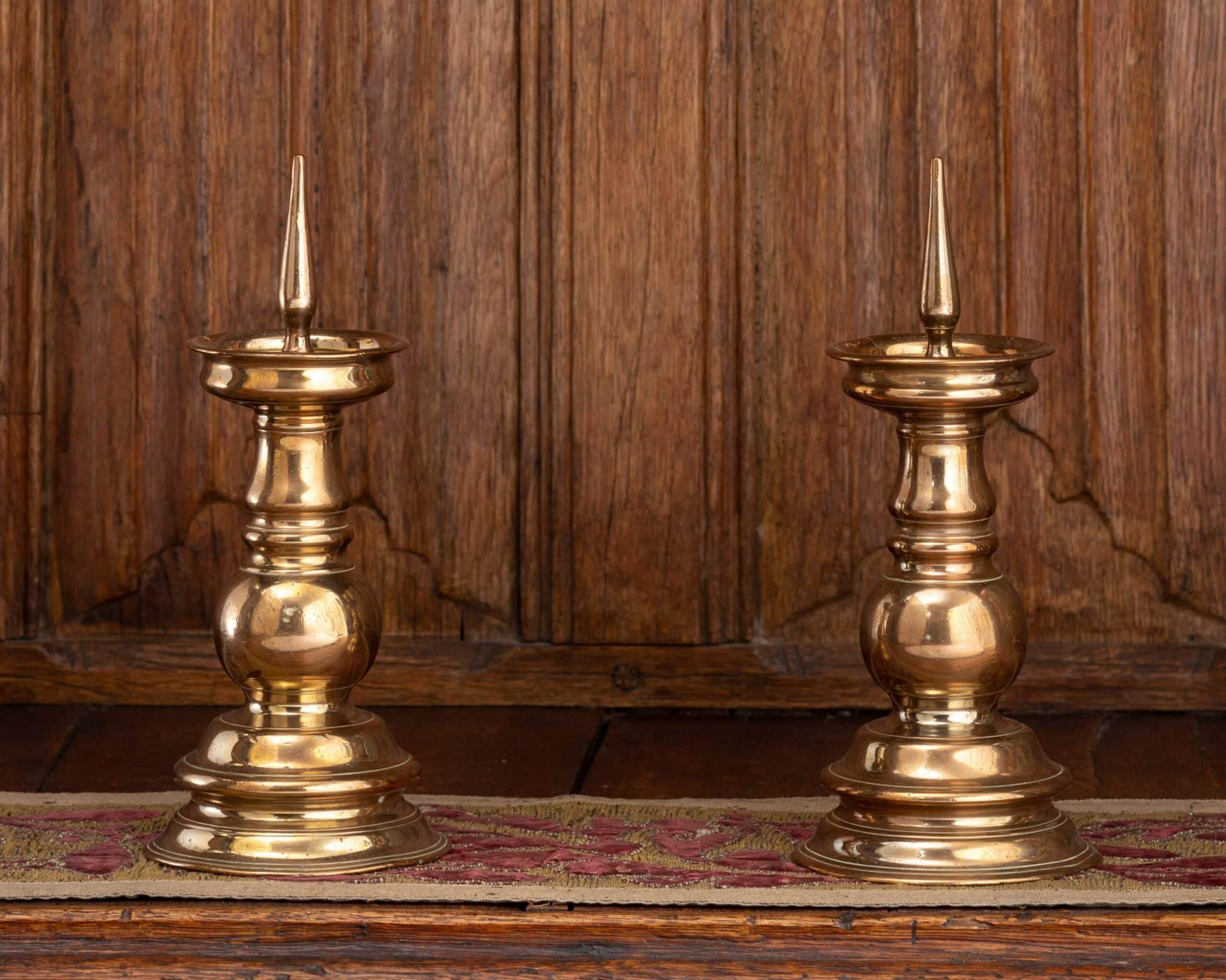 Pair of Renaissance brass pricket candlesticks