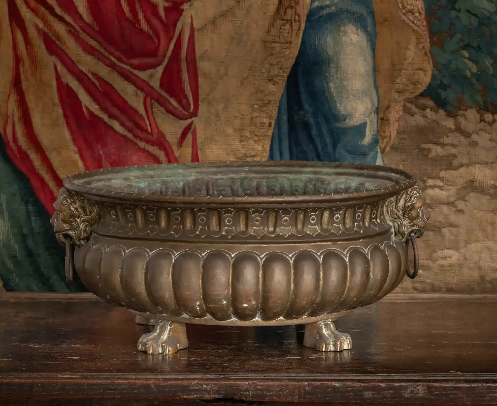 Brass Cistern with Lion-Mask Handles and Paw Feet