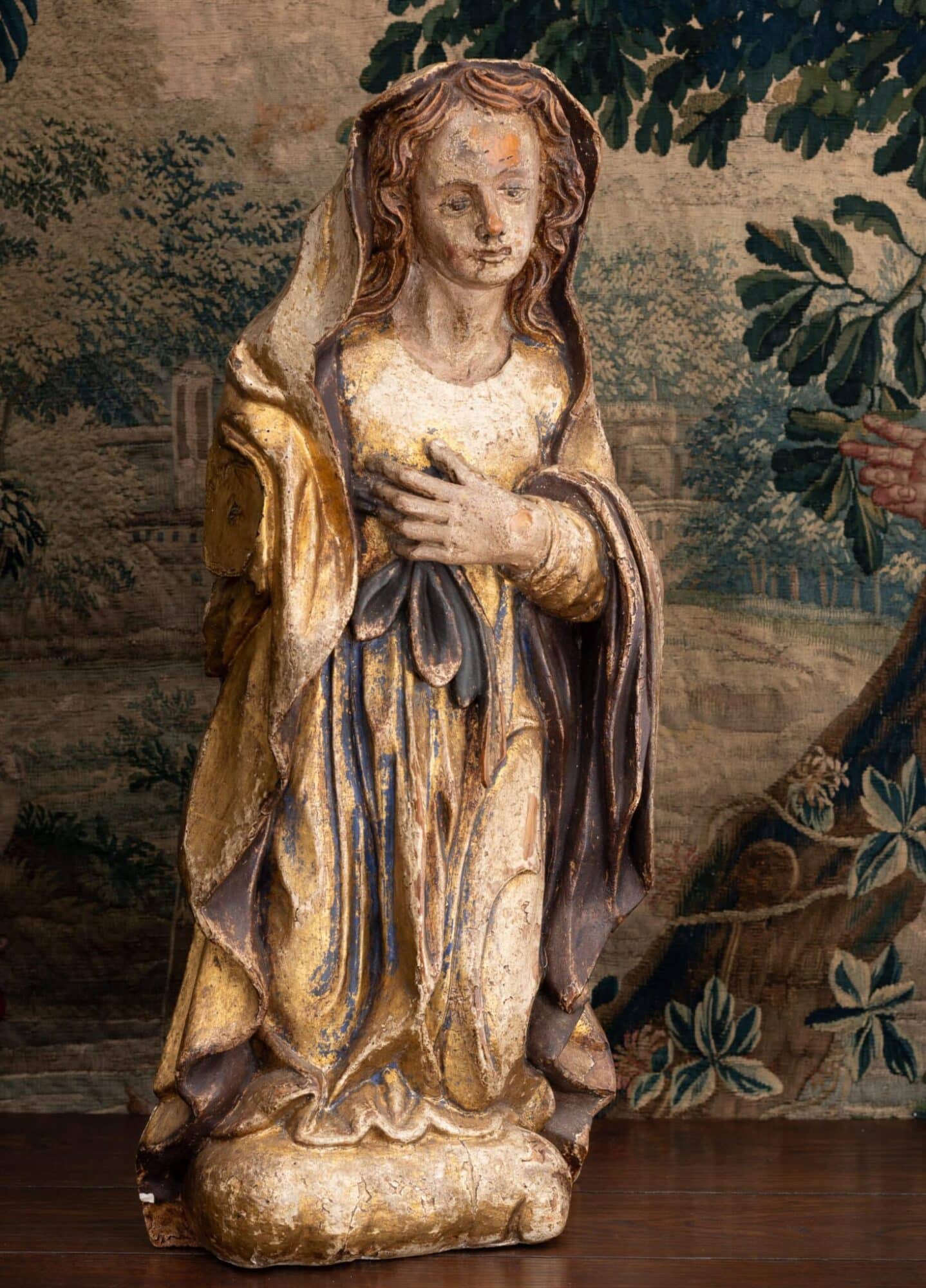 Late Gothic Polychromed Sculpture of a Kneeling Female Saint