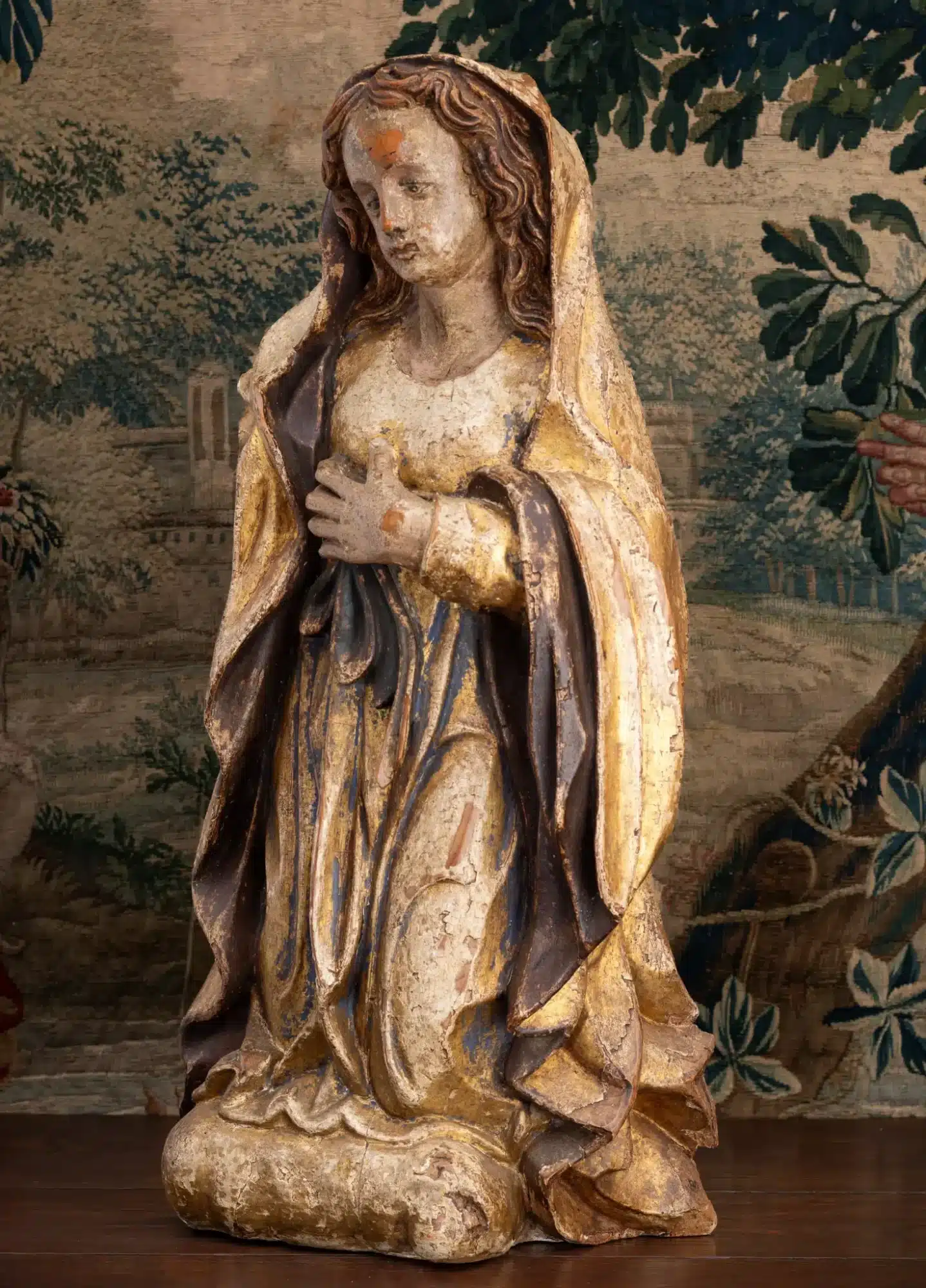 Late Gothic Polychromed Sculpture of a Kneeling Female Saint
