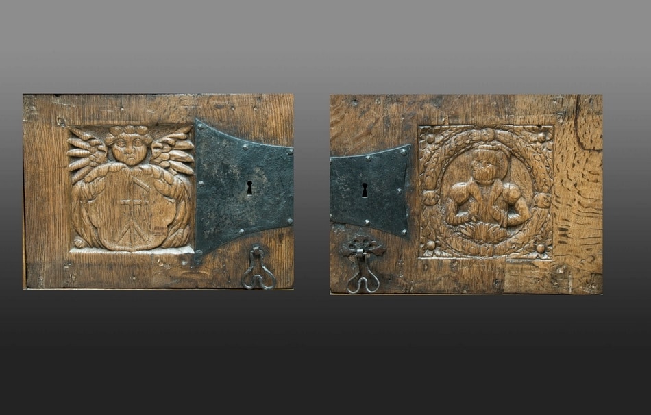 Pair of carved oak doors form a late medieval English standing cupboard