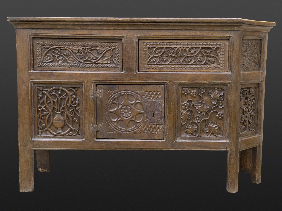 Henry VIII carved oak canted cupboard