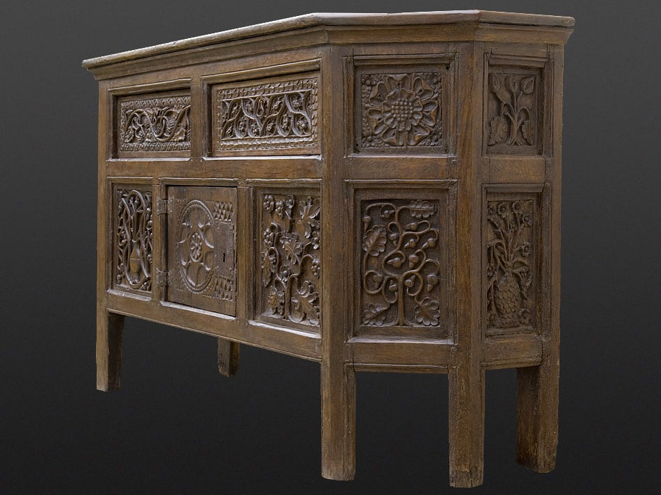 Henry VIII carved oak canted cupboard